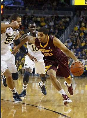 Jordan Morgan (52) and Tim Hardaway Jr. (10)
