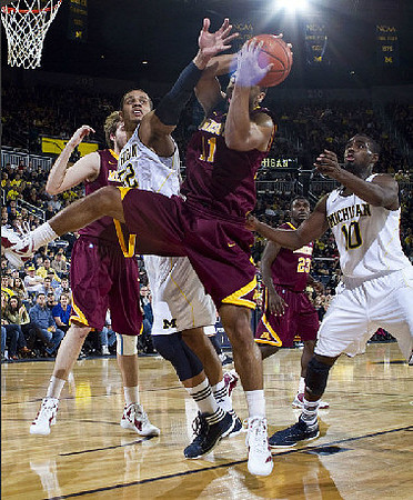 Jordan Morgan (52) and Tim Hardaway Jr. (10)
