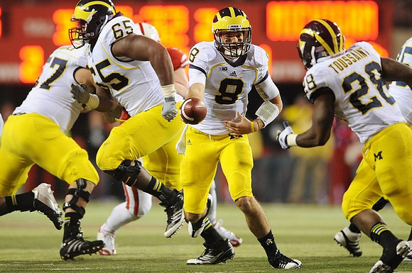 Taylor Lewan (77), Patrick Omameh (65), Russell Bellomy (8), Fitzgerald Toussaint (28), and Michael Schofield (75)