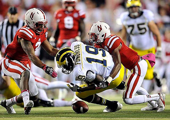 Devin Funchess (19) and Michael Schofield (75)