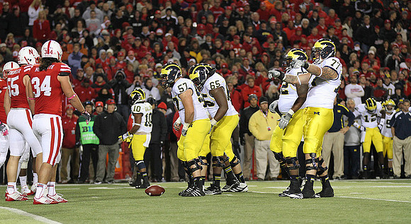 Jeremy Gallon (10), Elliott Mealer (57), Patrick Omameh (65), Ricky Barnum (52), and Taylor Lewan (77)