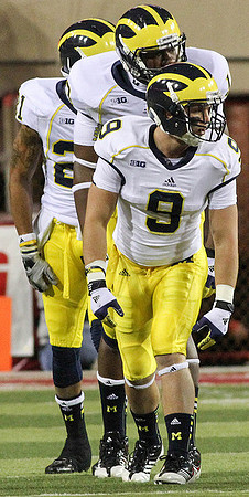 Drew Dileo (9), Devin Funchess (19), and Roy Roundtree (21)