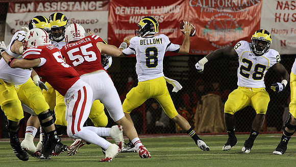 Elliott Mealer (57), Russell Bellomy (8), and Fitzgerald Toussaint (28)