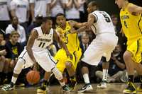 Trey Burke (3) and Mitch McGary (4)