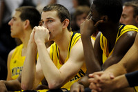 Mitch McGary (4), Nik Stauskas (11), and Caris LeVert (23)