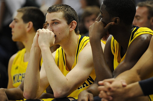 Mitch McGary (4), Nik Stauskas (11), and Caris LeVert (23)