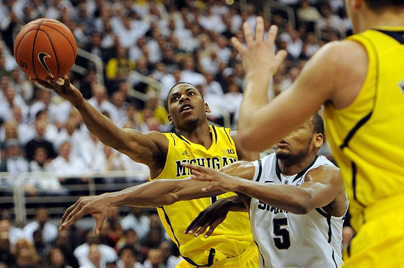 Glenn Robinson III (1) and Mitch McGary (4)