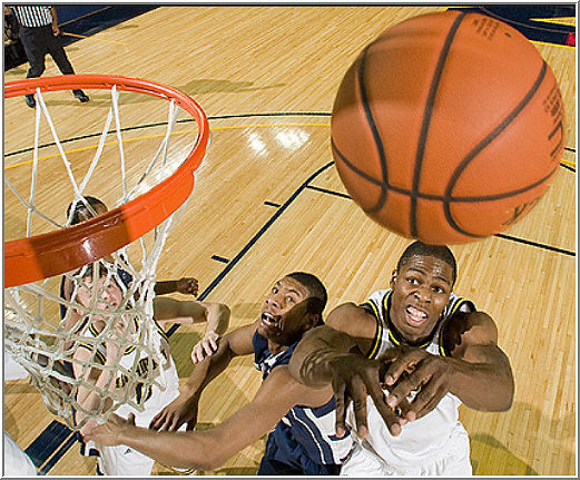 DeShawn Sims (34) and Zack Novak (0)