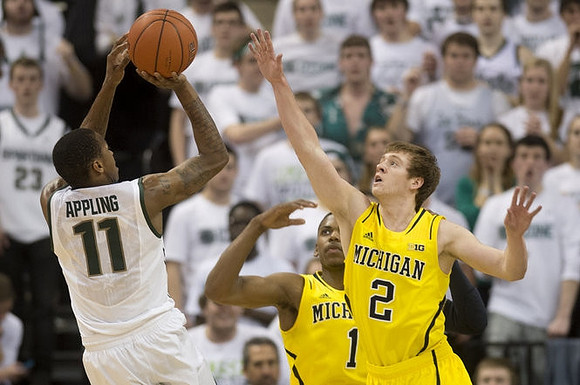 Glenn Robinson III (1) and Spike Albrecht (2)
