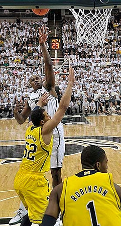 Jordan Morgan (52) and Glenn Robinson III (1)