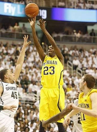 Caris LeVert (23) and Nik Stauskas (11)
