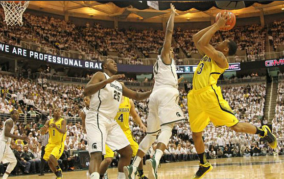 Glenn Robinson III (1), Mitch McGary (4), and Trey Burke (3)