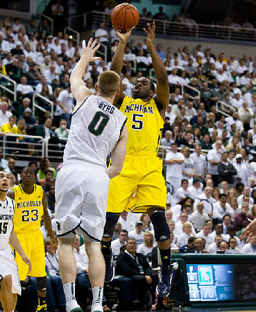 Caris LeVert (23) and Eso Akunne (5)