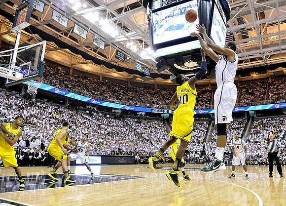 Trey Burke (3), Mitch McGary (4), Tim Hardaway Jr. (10), and Nik Stauskas (11)