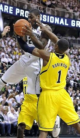 Glenn Robinson III (1) and Tim Hardaway Jr. (10)