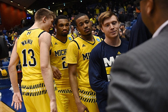 Moritz Wagner (13), Zak Irvin (21), Muhammad-Ali Abdur-Rahkman (12), and Spike Albrecht (2)