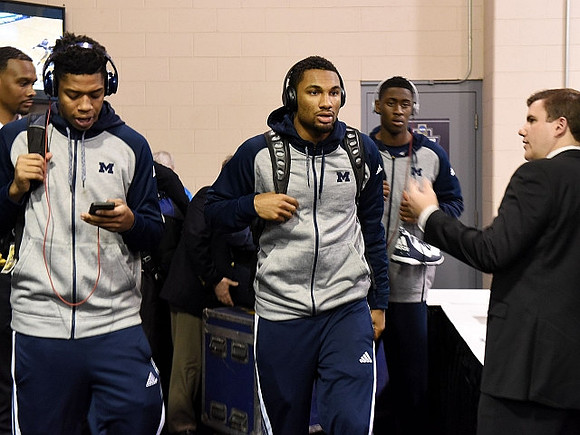 Kameron Chatman (3), Zak Irvin (21), and Caris LeVert (23)