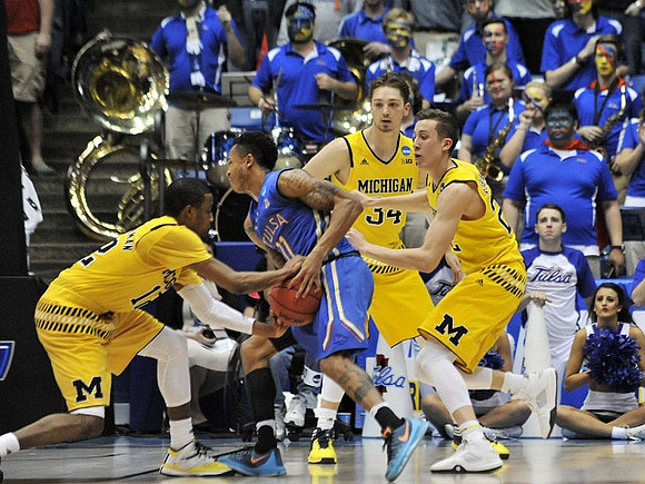 Muhammad-Ali Abdur-Rahkman (12), Mark Donnal (34), and Duncan Robinson (22)