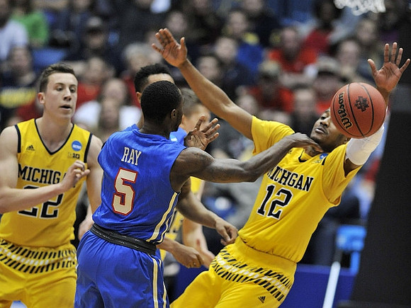 Duncan Robinson (22) and Muhammad-Ali Abdur-Rahkman (12)