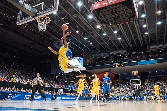 Derrick Walton Jr. (10), Zak Irvin (21), Moritz Wagner (13), and Muhammad-Ali Abdur-Rahkman (12)