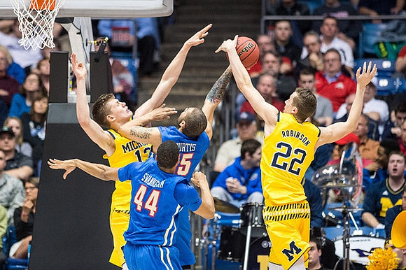 Moritz Wagner (13) and Duncan Robinson (22)