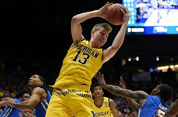 Moritz Wagner (13) and Aubrey Dawkins (24)