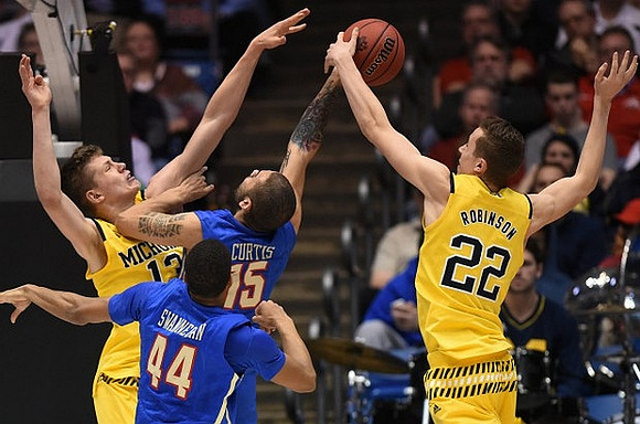 Moritz Wagner (13) and Duncan Robinson (22)