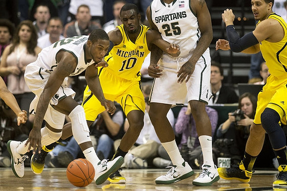 Tim Hardaway Jr. (10) and Jordan Morgan (52)