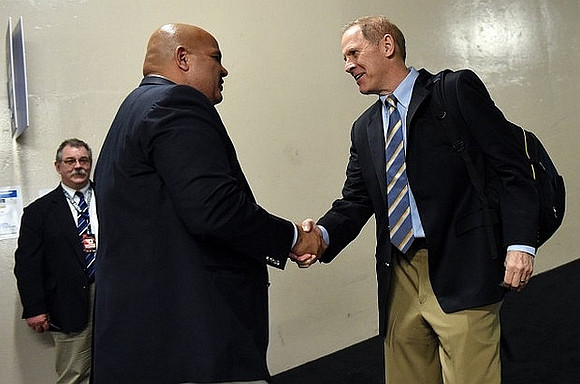 Michigan Athletic Director Warde Manuel and John Beilein