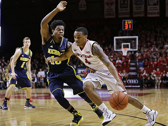 Spike Albrecht (2) and Derrick Walton Jr. (10)