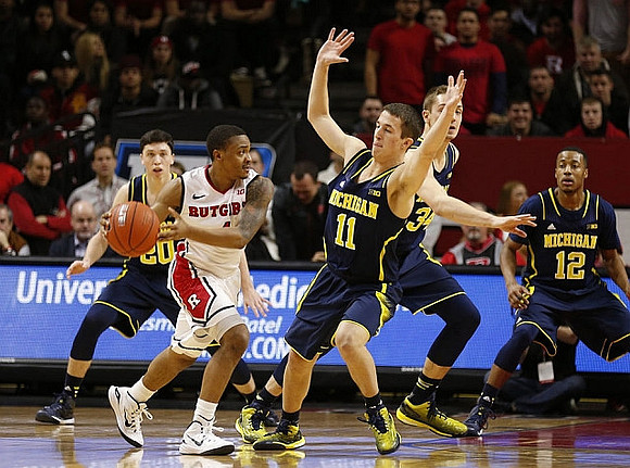 Sean Lonergan (20), Andrew Dakich (11), Mark Donnal (34), and Muhammad-Ali Abdur-Rahkman (12)
