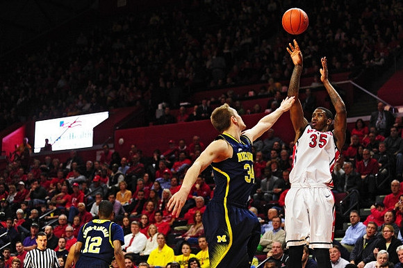 Muhammad-Ali Abdur-Rahkman (12) and Mark Donnal (34)