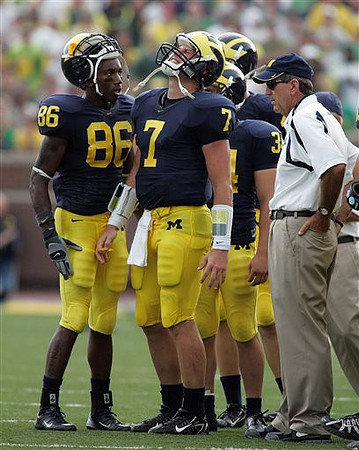 Chad Henne, Lloyd Carr, Mario Manningham, and Jason Gingell