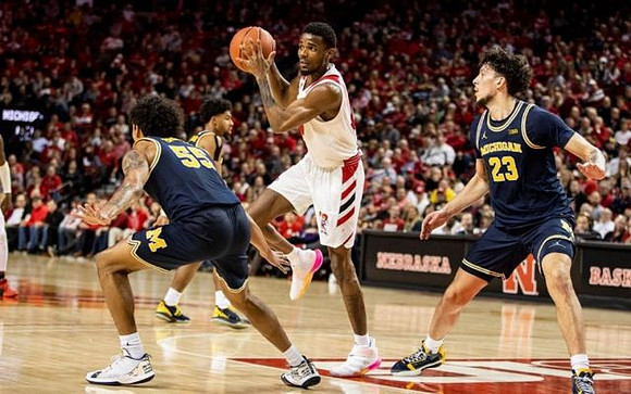Eli Brooks (55) and Brandon Johns Jr. (23)