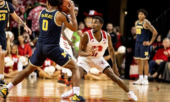 Brandon Johns Jr. (23), David DeJulius (0), and Eli Brooks (55)