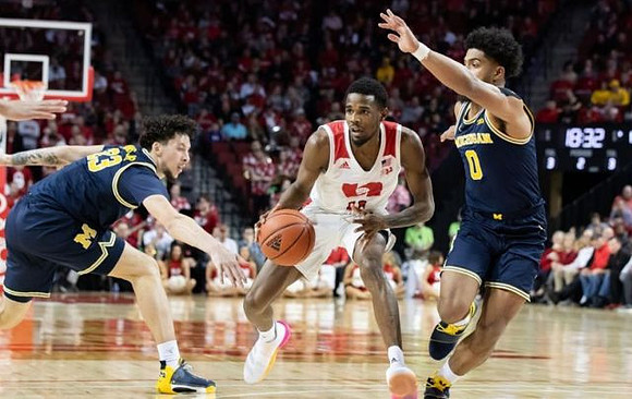 Brandon Johns Jr. (23) and David DeJulius (0)