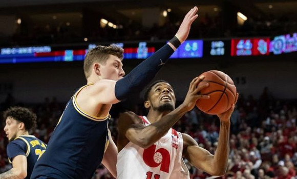 Brandon Johns Jr. (23) and Jon Teske (15)