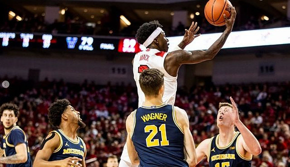 Brandon Johns Jr. (23), David DeJulius (0), Franz Wagner (21), and Jon Teske (15)