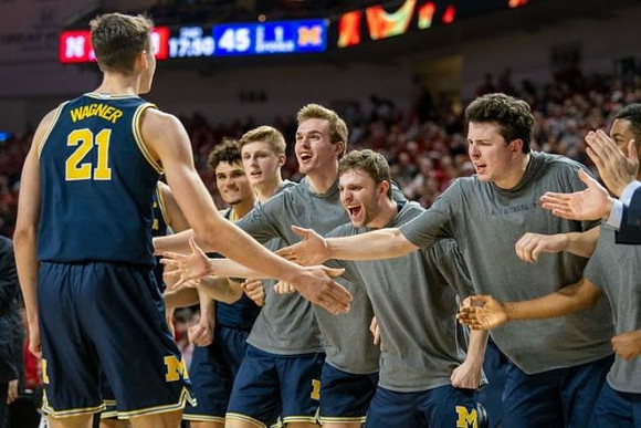 Franz Wagner (21) and Michigan Team
