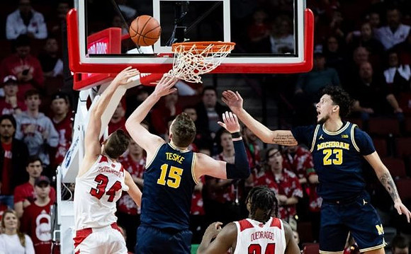 Jon Teske (15) and Brandon Johns Jr. (23)