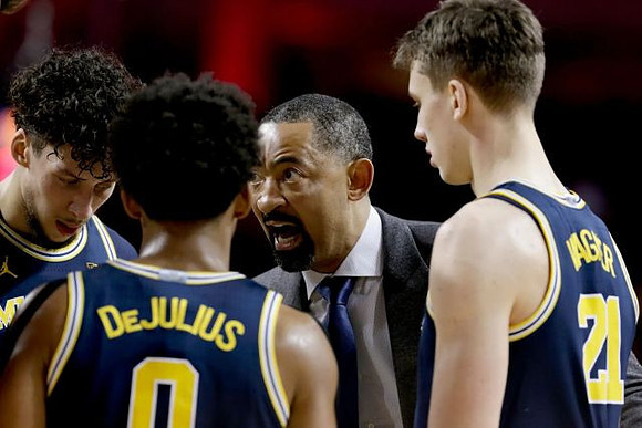 Brandon Johns Jr. (23), David DeJulius (0), Juwan Howard, and Franz Wagner (21)