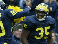 B.J. Askew (35) and Obi Oluigbo (81)