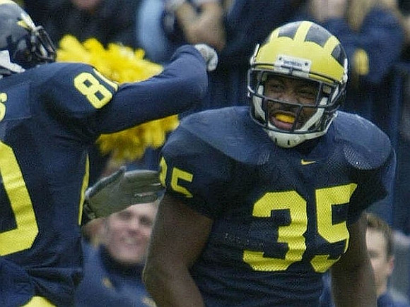 B.J. Askew (35) and Obi Oluigbo (81)