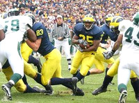B.J. Askew (35) and Bennie Joppru (83)