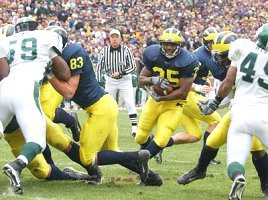 B.J. Askew (35) and Bennie Joppru (83)