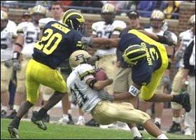Marlin Jackson (20) and Todd Howard (3)