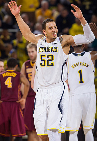 Jordan Morgan (52) and Glenn Robinson III (1)