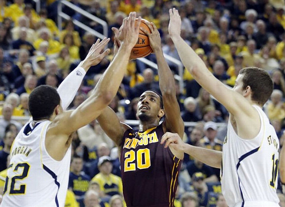 Jordan Morgan (52) and Nik Stauskas (11)