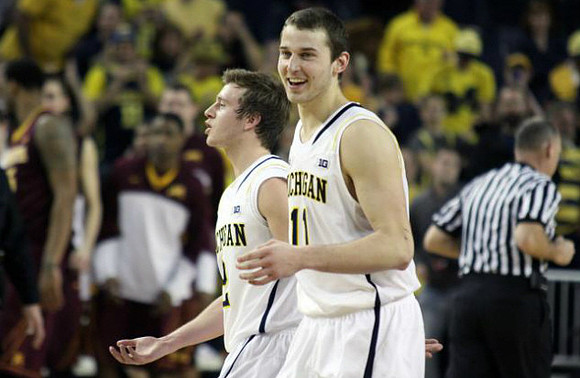 Spike Albrecht (2) and Nik Stauskas (11)