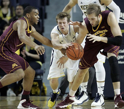 Spike Albrecht (2) and Jordan Morgan (52)